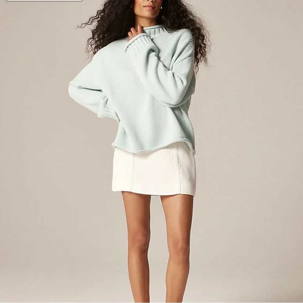 2025 Rollneck™ sweater in Sheer Blue